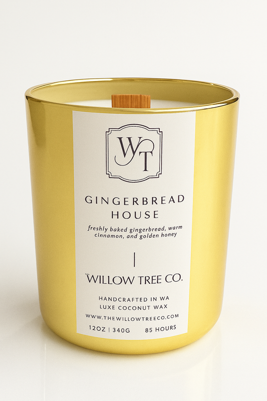Gold candle with a white label featuring 'Willow Tree Co.' on a light background