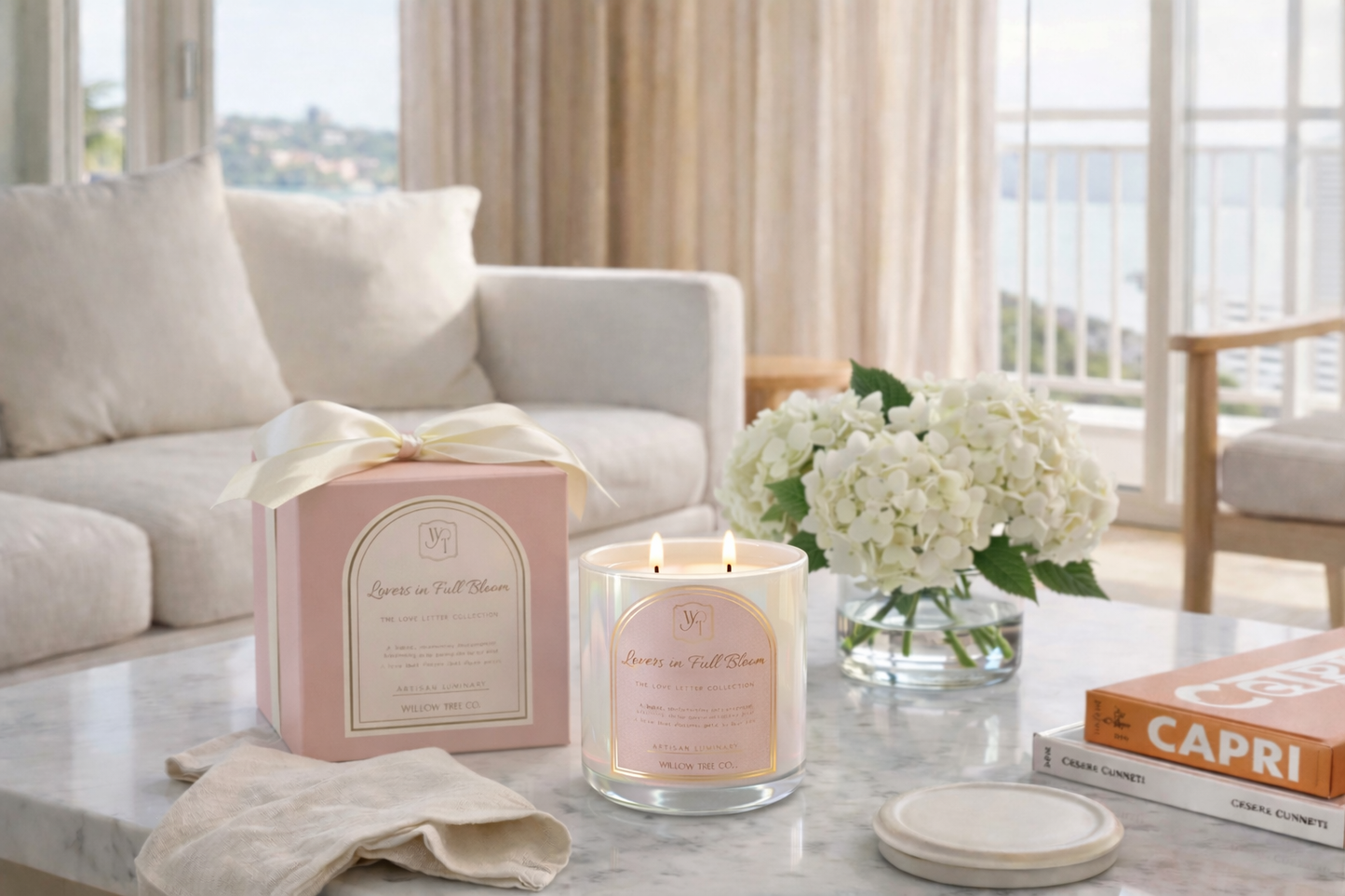 Candle with packaging and flowers on a coffee table in a living room setting