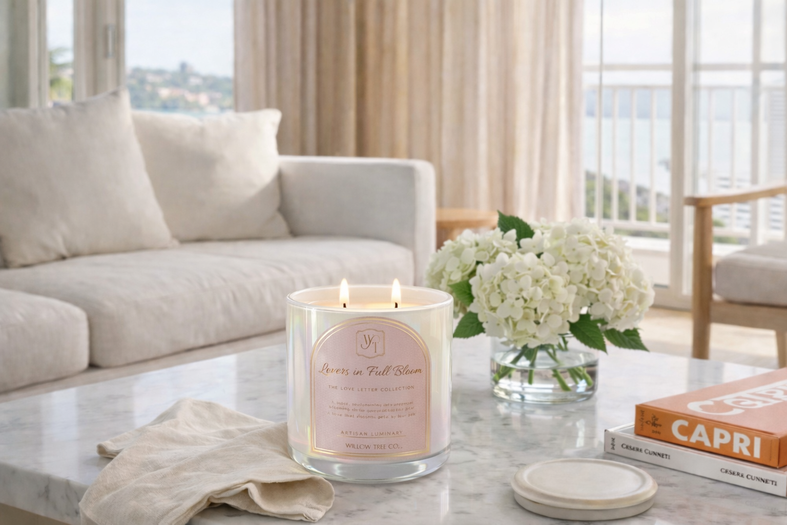Candle with a pink label on a coffee table in a living room setting