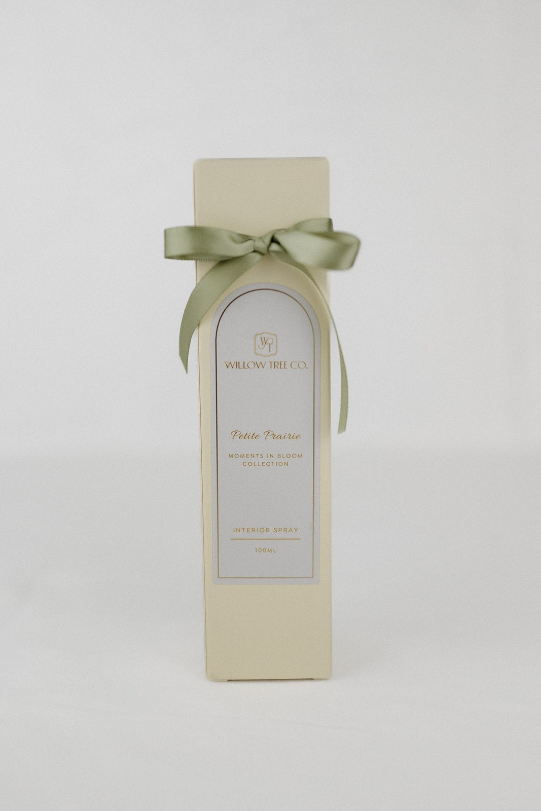 Gift box with a green ribbon on a white background